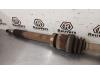 Drivaxel, höger fram från en Ford Focus 3 1.6 Ti-VCT 16V 105 2011