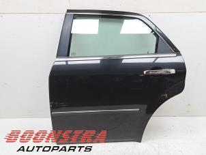 Używane Drzwi lewe tylne wersja 4-drzwiowa Chrysler 300 C 5.7 V8 Hemi Cena € 49,95 Procedura marży oferowane przez Boonstra Autoparts