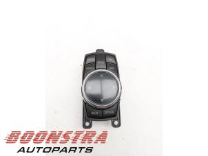 Gebruikte I-Drive knop BMW 1 serie (F21) 114i 1.6 16V Prijs € 114,95 Margeregeling aangeboden door Boonstra Autoparts