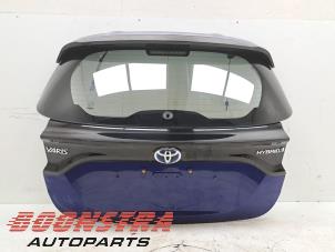 Używane Tylna klapa Toyota Yaris IV (P21/PA1/PH1) 1.5 12V Hybrid 115 Cena € 699,00 Procedura marży oferowane przez Boonstra Autoparts