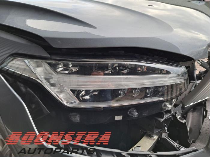 Strålkastare, höger från en Volvo XC90 II 2.0 D5 16V AWD 2015