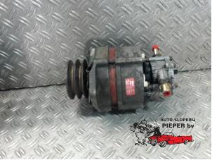 Begagnade Dynamo Nissan Vanette (C23) 2.3 D E/Cargo Pris på förfrågan erbjuds av Autosloperij Pieper BV