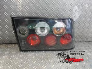 Begagnade Baklykta, höger Opel Calibra 2.5 V6 24V Pris € 26,25 Marginaltabell erbjuds av Autosloperij Pieper BV