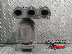 Używane Kolektor wydechowy + katalizator Volkswagen Polo V (6R) 1.2 12V Cena € 236,25 Procedura marży oferowane przez Autosloperij Pieper BV