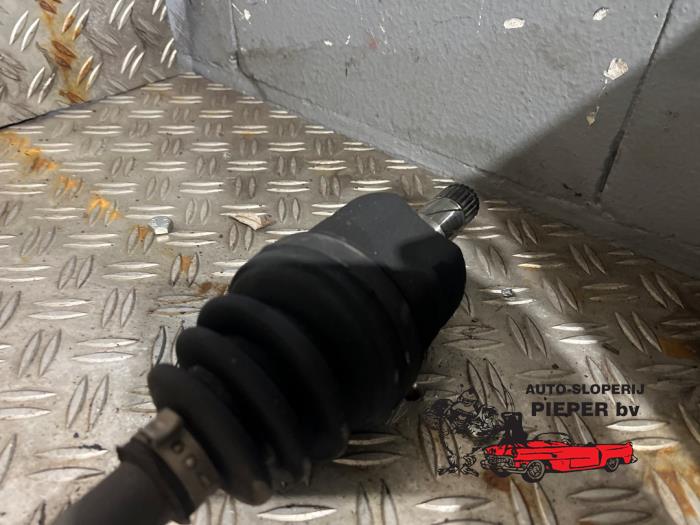 Drivaxel, höger fram från en Opel Corsa D 1.2 16V 2008