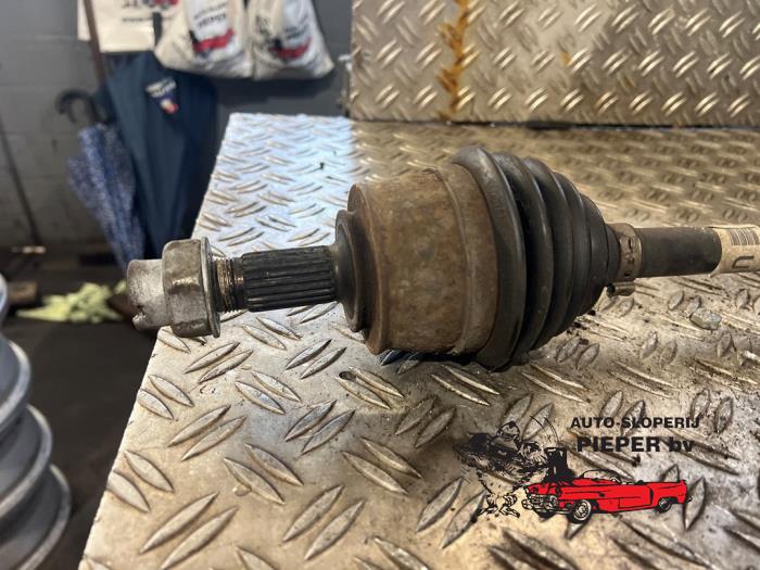 Drivaxel, höger fram från en Opel Corsa D 1.2 16V 2008