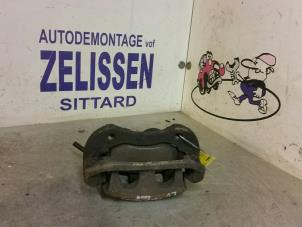 Gebruikte Remklauw (Tang) rechts-voor Ford Transit Prijs € 47,25 Margeregeling aangeboden door Zelissen V.O.F. autodemontage