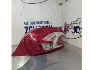 Gebruikte Achterlicht rechts Peugeot 208 I (CA/CC/CK/CL) 1.6 Blue HDi 100 Prijs € 57,75 Margeregeling aangeboden door Zelissen V.O.F. autodemontage