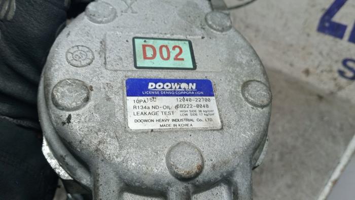 Luftkonditioneringspump från en Kia Cerato 1.6 16V 2006