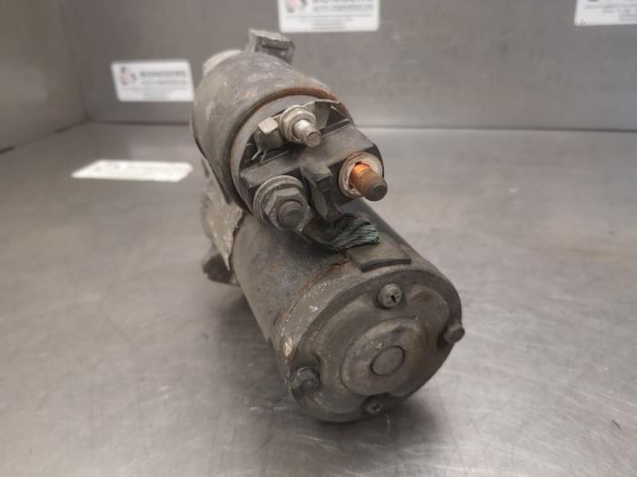 Startmotor van een Opel Insignia 2.8 V6 Turbo 24V 4x4 OPC Ecotec 2011