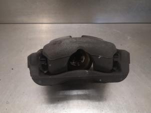 Begagnade Främre bromsok, höger Mini Mini (R56) 1.4 16V One Pris på förfrågan erbjuds av Bongers Auto-Onderdelen Zeeland