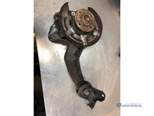 Gebruikte Fusee rechts-achter Mini Mini (R56) 1.6 16V Cooper Prijs € 80,00 Margeregeling aangeboden door Autobedrijf Brooks