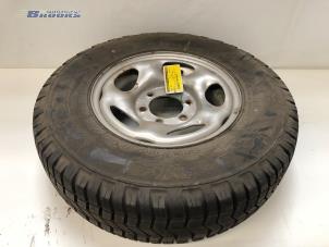 Gebruikte Velg + Band Ford Maverick Prijs € 50,00 Margeregeling aangeboden door Autobedrijf Brooks