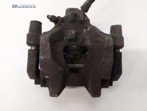 Gebruikte Remklauw (Tang) links-achter Mercedes C Estate (S204) 1.8 C-180 CGI 16V Prijs € 30,00 Margeregeling aangeboden door Autobedrijf Brooks