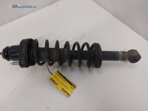 Używane Stopa amortyzatora prawy tyl Mitsubishi ASX 1.6 MIVEC 16V Cena € 40,00 Procedura marży oferowane przez Autobedrijf Brooks