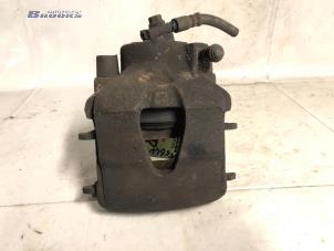 Używane Zacisk hamulcowy lewy przód Audi A3 Sportback (8PA) 1.6 FSI 16V Cena € 15,00 Procedura marży oferowane przez Autobedrijf Brooks