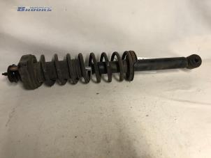 Gebruikte Schokdemperpoot links-achter Mitsubishi Colt (CJ) 1.3 GL,GLX 12V Prijs € 15,00 Margeregeling aangeboden door Autobedrijf Brooks