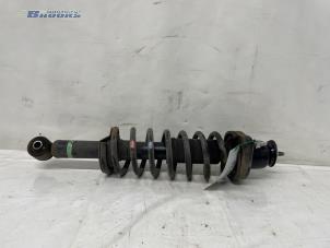 Używane Stopa amortyzatora prawy tyl Mitsubishi Outlander (GF/GG) 2.0 16V 4x2 Cena € 40,00 Procedura marży oferowane przez Autobedrijf Brooks