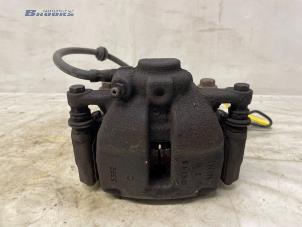 Begagnade Främre bromsok, höger Mini Clubman (R55) 1.4 16V One Pris € 15,00 Marginaltabell erbjuds av Autobedrijf Brooks