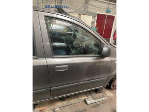 Gebruikte Portier 4Deurs rechts-voor Fiat Panda (169) 1.2, Classic Prijs € 75,00 Margeregeling aangeboden door Autobedrijf Brooks