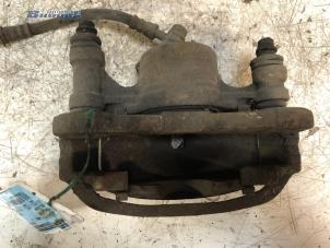 Begagnade Främre bromsok, vänster Toyota Celica (T18) 1.6 STi 16V Pris € 10,00 Marginaltabell erbjuds av Autobedrijf Brooks