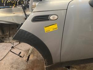 Gebruikte Spatbord links-voor Austin Mini Open (R52) 1.6 16V One Prijs € 52,50 Margeregeling aangeboden door van de Bunte Teuge B.V.