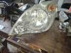 Strålkastare, vänster från en Suzuki Splash 1.0 12V 2009