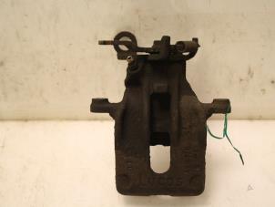 Begagnade Bakre bromsok, vänster Ford Focus 1 Wagon 1.8 TDCi 100 Pris € 65,00 Marginaltabell erbjuds av Van Gils Automotive