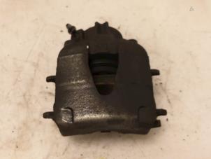 Begagnade Främre bromsok, höger Seat Ibiza IV (6J5) 1.0 EcoTSI 12V Pris € 32,00 Marginaltabell erbjuds av Van Gils Automotive