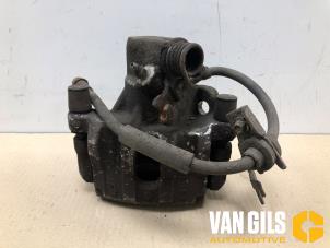 Begagnade Bakre bromsok, höger Ford Focus 3 Wagon 1.6 SCTi 16V Pris på förfrågan erbjuds av Van Gils Automotive