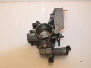 Begagnade Spjällhus Opel Calibra 2.0i 16V Ecotec Pris € 65,00 Marginaltabell erbjuds av Van Gils Automotive