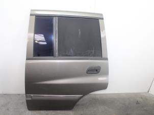 Begagnade Bakdörr, 4-dörrars, vänster Ssang Yong Musso 2.9TD Pris € 150,00 Marginaltabell erbjuds av Van Gils Automotive