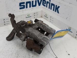 Usagé Zacisk hamulcowy lewy tyl Peugeot 308 SW (L4/L9/LC/LJ/LR) 1.6 BlueHDi 120 Prix € 44,99 Règlement à la marge proposé par Snuverink Autodemontage