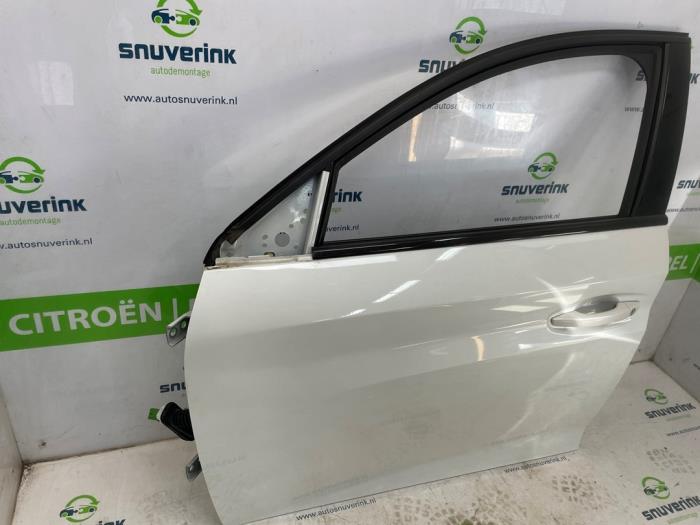 Dörr, 4-dörrars, vänster fram från en Peugeot 208 II (UB/UH/UP) e-208 50 kWh 2021