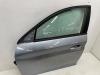 Dörr, 4-dörrars, vänster fram från en Peugeot 208 II (UB/UH/UP) e-208 50 kWh 2020