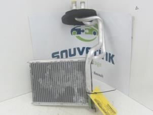 Begagnade Värmare radiator Renault Scénic III (JZ) 1.5 dCi 110 Pris € 40,00 Marginaltabell erbjuds av Snuverink Autodemontage