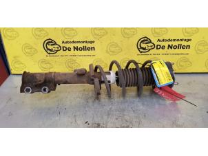 Używane Amortyzator lewy przód Ford Fiesta 6 (JA8) 1.0 EcoBoost 12V 100 Cena na żądanie oferowane przez de Nollen autorecycling