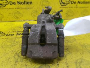 Begagnade Bakre bromsok, höger Renault Scénic I (JA) 1.4 16V Pris € 40,00 Marginaltabell erbjuds av de Nollen autorecycling