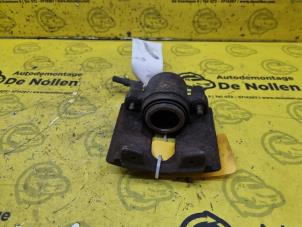 Gebruikte Remklauw (Tang) rechts-voor Ford Fiesta 5 (JD/JH) 1.3 Prijs € 40,00 Margeregeling aangeboden door de Nollen autorecycling