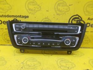 Begagnade Värmekontrollpanel BMW 4 serie (F32) 435i 3.0 24V Pris € 150,00 Marginaltabell erbjuds av de Nollen autorecycling