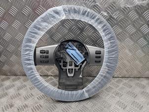 Używane Kierownica Nissan Navara (D40) 2.5 dCi 16V Cena € 60,50 Z VAT oferowane przez de Nollen autorecycling