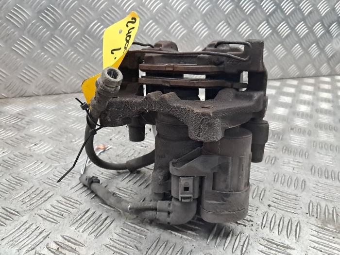 Bakre bromsok, vänster från en Volkswagen Golf VII (AUA) 1.6 TDI 16V 2014