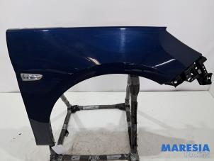 Begagnade Framskärm, höger Opel Astra K Sports Tourer 1.2 Turbo 12V Pris € 109,99 Marginaltabell erbjuds av Maresia Parts