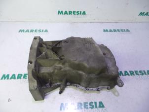 Begagnade Oljetråg Renault Clio III (BR/CR) 1.4 16V Pris € 40,00 Marginaltabell erbjuds av Maresia Parts