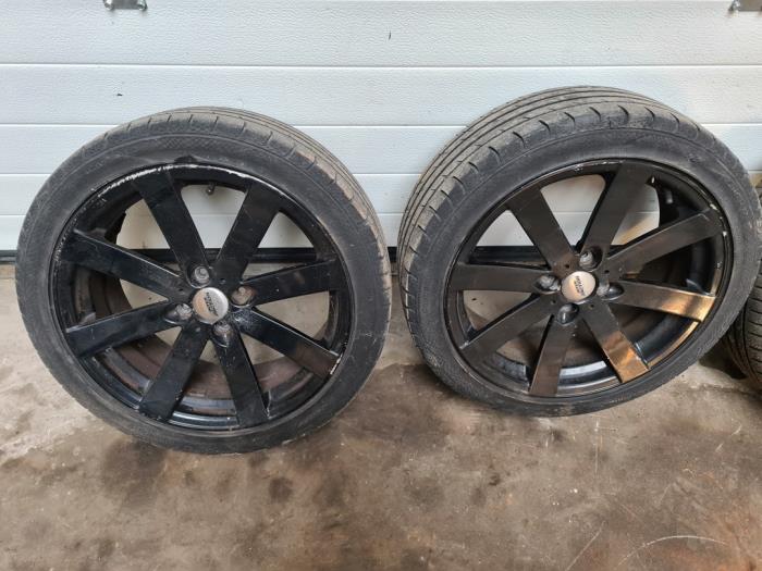 Velgen set + banden van een MINI Mini One/Cooper (R50) 1.6 16V Cooper 2002