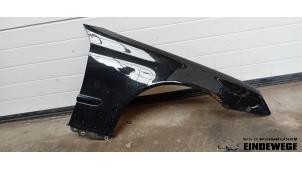 Gebruikte Scherm rechts-voor Mercedes C Sportcoupé (C203) 1.8 C-180K 16V Prijs € 165,00 Margeregeling aangeboden door Auto- en demontagebedrijf Eindewege