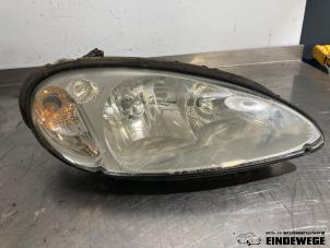 Gebruikte Koplamp rechts Chrysler PT Cruiser 2.2 CRD 16V Prijs € 35,00 Margeregeling aangeboden door Auto- en demontagebedrijf Eindewege