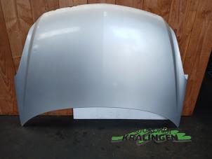 Begagnade Motorhuv Opel Corsa D 1.2 16V Pris € 99,99 Marginaltabell erbjuds av Autosloperij Kralingen B.V.