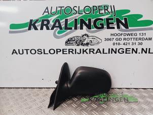 Gebruikte Buitenspiegel links Toyota Corolla (E10) 1.3i 16V Prijs € 24,98 Margeregeling aangeboden door Autosloperij Kralingen B.V.