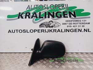 Gebruikte Buitenspiegel links Toyota Corolla (E11) 1.6 16V Prijs € 24,98 Margeregeling aangeboden door Autosloperij Kralingen B.V.